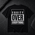 Equity Over Everything tee on neutral stone background