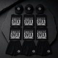 EPG Founder Bundle with three EPG hats six Equity Over Everything shirts and three EPG shorts on dark stone slab